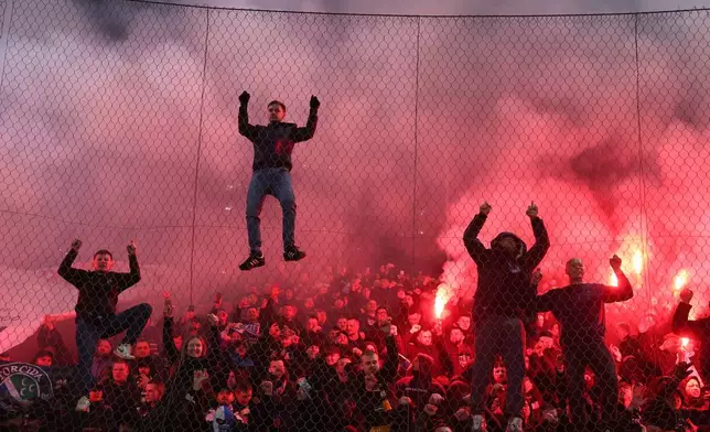 Fans react after a penalty shootout at the end of the World Cup qualifying playoff final soccer match between Bosnia and Italy in Zenica, Bosnia, Tuesday, March 31, 2026. (AP Photo/Armin Durgut)