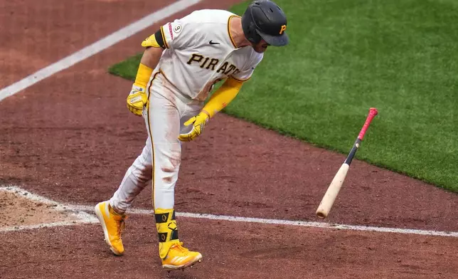 Pittsburgh Pirates' Ryan O'Hearn throws down his bat after flying out against Baltimore Orioles pitcher Shane Baz to end the fifth inning of a baseball game in Pittsburgh, Saturday, April 4, 2026. (AP Photo/Gene J. Puskar)