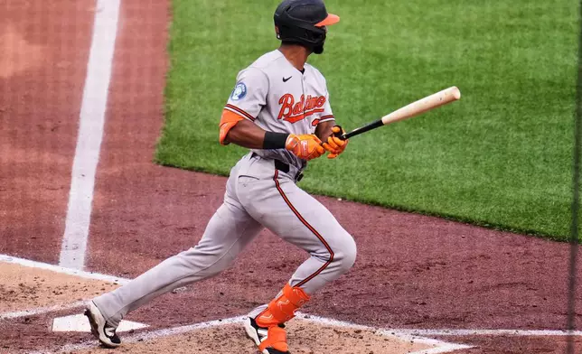 Baltimore Orioles' Leody Taveras singles off Pittsburgh Pirates pitcher Carmen Mlodzinski, driving in a run, during the fourth inning of a baseball game in Pittsburgh, Saturday, April 4, 2026. (AP Photo/Gene J. Puskar)