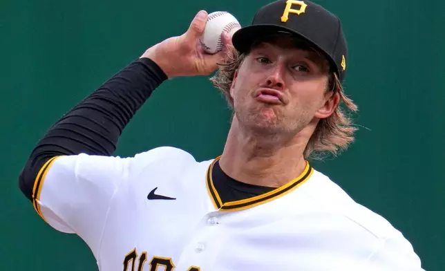 Pittsburgh Pirates pitcher Carmen Mlodzinski delivers during the second inning of a baseball game against the Baltimore Orioles in Pittsburgh, Saturday, April 4, 2026. (AP Photo/Gene J. Puskar)