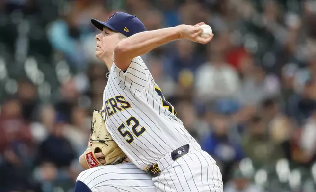 Milwaukee Brewers pitcher Kyle Harrison (52) throws during the first inning of a baseball game against the Pittsburgh Pirates Sunday, April 26, 2026, in Milwaukee. (AP Photo/Jeffrey Phelps)