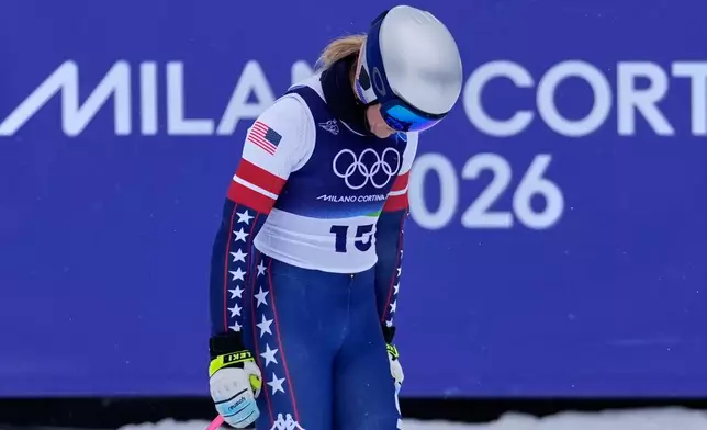 FILE - United States' Lindsey Vonn arrives at the finish area during the alpine ski women's downhill training at the 2026 Winter Olympics, in Cortina d'Ampezzo, Italy, Saturday, Feb. 7, 2026. (AP Photo/Robert F. Bukaty, File)