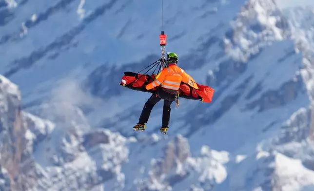FILE - United States' Lindsey Vonn is airlifted away after a crash during an alpine ski women's downhill race at the 2026 Winter Olympics, in Cortina d'Ampezzo, Italy, Sunday, Feb. 8, 2026. (AP Photo/Jacquelyn Martin, File)