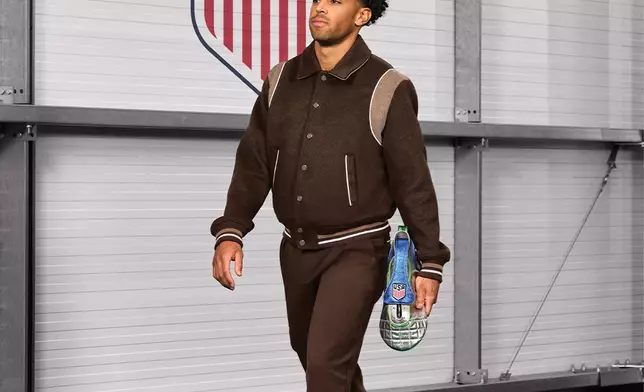 U.S. Men’s National Team midfielder, Tyler Adams carries the limited-edition Tunnel Walk Bag, a cleat-inspired dopp kit that merges style with wellness and totes essentials like Advil and Sensodyne.
