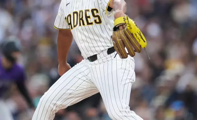San Diego Padres starting pitcher Randy Vásquez works against a Colorado Rockies batter during the first inning of a baseball game Thursday, April 9, 2026, in San Diego. (AP Photo/Gregory Bull)