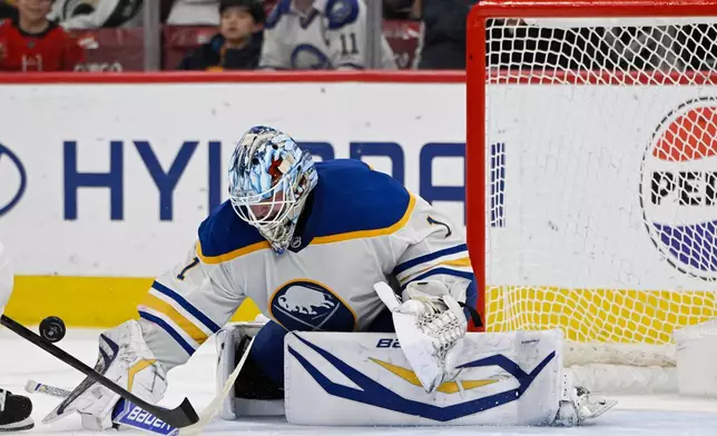 Buffalo Sabres goalie Ukko-Pekka Luukkonen makes a save during the second period of an NHL hockey game against the Chicago Blackhawks in Chicago, Monday, April 13, 2026. (AP Photo/Paul Beaty)