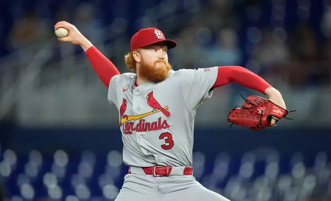 St. Louis Cardinals starting pitcher Dustin May pitches during the first inning of a baseball game against the Miami Marlins, Tuesday, April 21, 2026, in Miami. (AP Photo/Rebecca Blackwell)