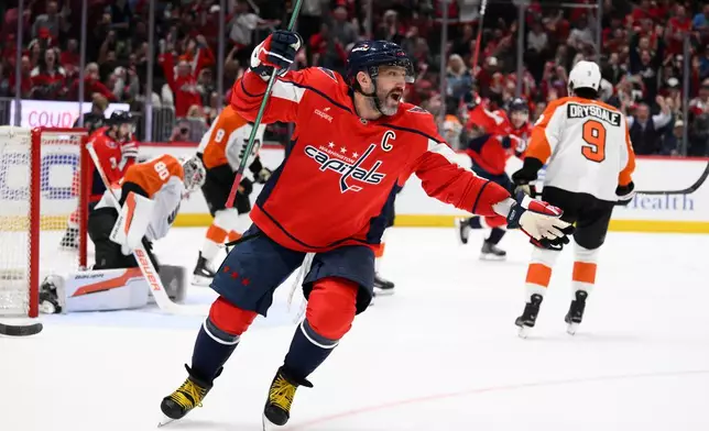 Washington Capitals left wing Alex Ovechkin (8) celebrates his goal during the first period of an NHL hockey game against the Philadelphia Flyers, Tuesday, March 31, 2026, in Washington. (AP Photo/Nick Wass)