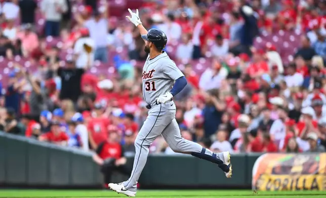 Detroit Tigers' Riley Greene reacts after hitting a solo home run during the second inning of a baseball game against the Cincinnati Reds in Cincinnati, Friday, April 24, 2026. (AP Photo/Ben Jackson)