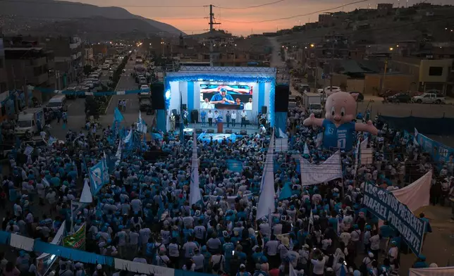 Presidential candidate Rafael López Aliaga, of the Popular Renewal party, delivers a speech during a campaign rally in the Manchay neighborhood in Lima, Peru, Saturday, April 4, 2026. (AP Photo/Guadalupe Pardo)