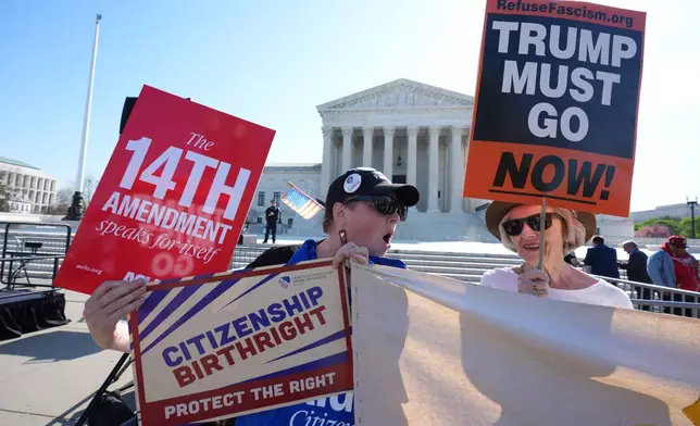 Pro and anti-Trump demonstrators rally outside the U.S. Supreme Court, before justices hear oral arguments on whether President Donald Trump can deny citizenship to children born to parents who are in the United States illegally or temporarily, on Capitol Hill, in Washington, Wednesday, April 1, 2026. (AP Photo/J. Scott Applewhite)