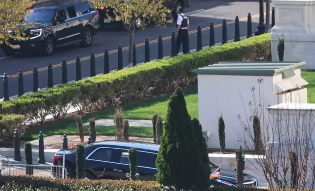 President Donald Trump's motorcade arrives at the U.S. Supreme Court, Wednesday, April 1, 2026, in Washington. (AP Photo/Tom Brenner)
