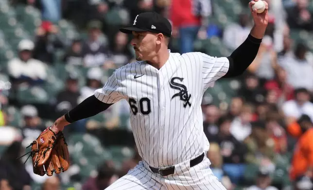 Chicago White Sox starting pitcher Bryan Hudson throws against the Washington Nationals during the first inning of a baseball game at Rate Field in Chicago, Sunday, April 26, 2026. (AP Photo/Nam Y. Huh)