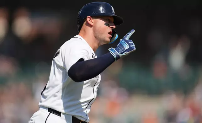 Detroit Tigers' Spencer Torkelson reacts to his walk off home run against the Milwaukee Brewers during the ninth inning of a baseball game Thursday, April 23, 2026, in Detroit. (AP Photo/Paul Sancya)
