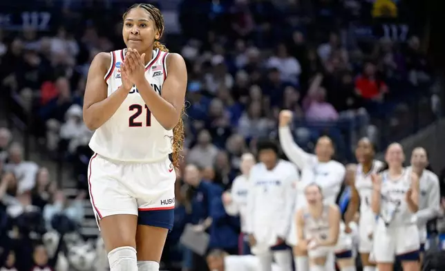 FILE - UConn forward Sarah Strong (21) reacts during the first half in the second round of the NCAA college basketball tournament against Syracuse, Monday, March 23, 2026, in Storrs, Conn. (AP Photo/Jessica Hill, File)