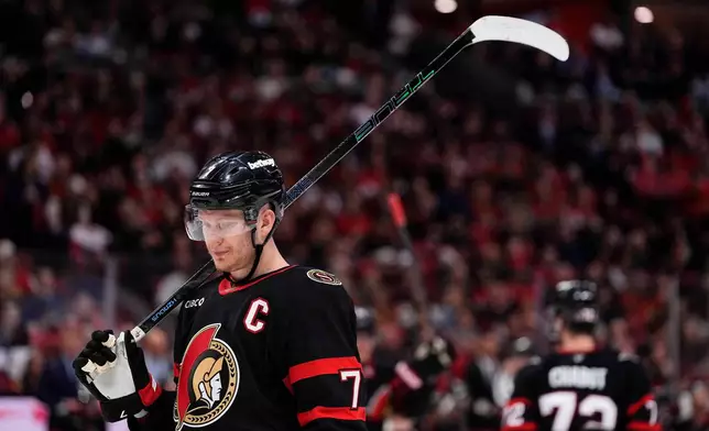 Ottawa Senators' Brady Tkachuk (7) waits for a faceoff during second period NHL playoff hockey game against the Carolina Hurricanes in Ottawa, on Thursday, April 23, 2026. (Justin Tang/The Canadian Press via AP)