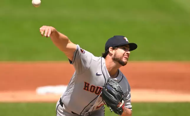 Houston Astros pitcher Peter Lambert delivers in the first inning of a baseball game against the Cleveland Guardians in Cleveland, Wednesday, April 22, 2026. (AP Photo/David Richard)