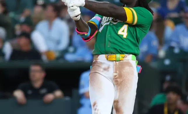 Athletics' Lawrence Butler watches his three run home during the fourth inning of a baseball game against the Kansas City Royals, Wednesday, April 29, 2026, in West Sacramento, Calif. (AP Photo/Scott Marshall)