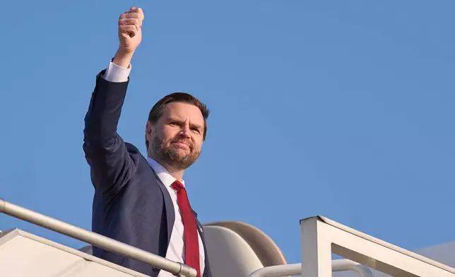 Vice President JD Vance gives a thumbs up gesture while boarding Air Force Two as he leaves Islamabad, Sunday, April 12, 2026, after attending talks on Iran. (AP Photo/Jacquelyn Martin, Pool)