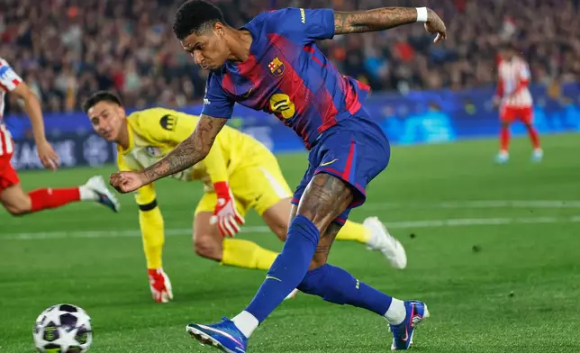 Barcelona's Marcus Rashford makes an attempt to score during the Champions League quarterfinal first leg soccer match between Barcelona and Atletico Madrid in Barcelona, Spain, Wednesday, April 8, 2026. (AP Photo/Joan Monfort)