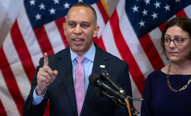 House Minority Leader Hakeem Jeffries, D-N.Y., speaks about Virginia's redistricting vote as Democratic Congressional Campaign Committee Chairman Suzan DelBene, D-Wash., right, looks on, at the Democratic National Committee headquarters in Washington, Wednesday, April 22, 2026. Virginia voters approved a congressional redistricting plan that could help Democrats win up to four additional U.S. House seats in this year's midterm elections.(AP Photo/Cliff Owen)