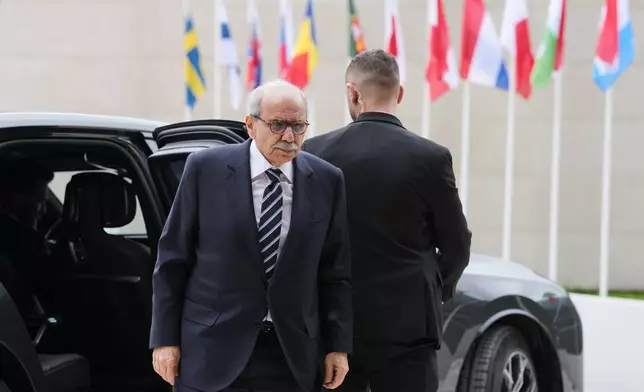 Lebanon's Prime Minister Nawaf Salam arrives for a meeting of EU foreign ministers at the European Council building in Luxembourg, Tuesday, April 21, 2026. (AP Photo/Virginia Mayo)