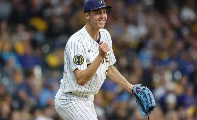 Milwaukee Brewers pitcher Jacob Misiorowski (32) reacts after striking out a Pittsburgh Pirates batter in the third inning of a baseball game Saturday, April 25, 2026, in Milwaukee. (AP Photo/Jeffrey Phelps)