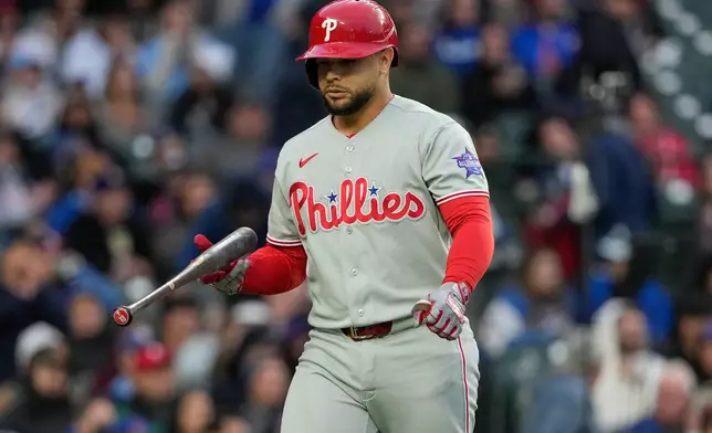 Philadelphia Phillies' Rafael Marchán reacts after striking out swinging during the second inning of a baseball game against the Chicago Cubs in Chicago, Monday, April 20, 2026. (AP Photo/Nam Y. Huh)
