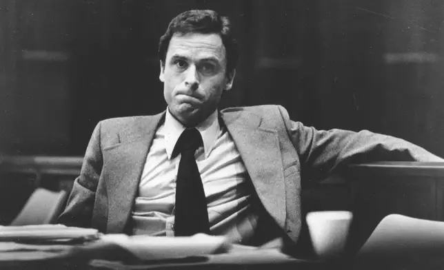 FILE - Accused murderer Ted Bundy attends the second day of jury selection in his murder trial, June 27, 1979, in Miami, Fla. (AP Photo,File)