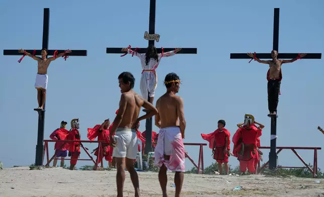 A reenactment of Jesus Christ's sufferings as part of Good Friday rituals in the San Pedro Cutud village, Pampanga province, northern Philippines, Friday April 3, 2026. (AP Photo/Aaron Favila)