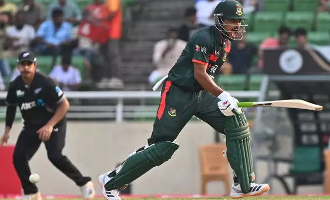 Bangladesh's Najmul Hossain Shanto takes a run during the second one day international cricket match between Bangladesh and New Zealand in Mirpur, Bangladesh, Monday, April 20, 2026. (AP Photo/Mosaraf Hossain)