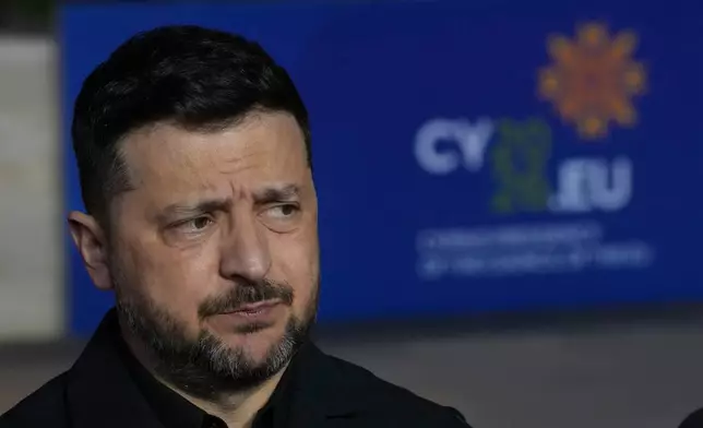 Ukraine's President Volodymyr Zelenskyy makes statements as he arrives for the EU Summit in Ayia Napa, Cyprus, Thursday, April 23, 2026. (AP Photo/Petros Karadjias)