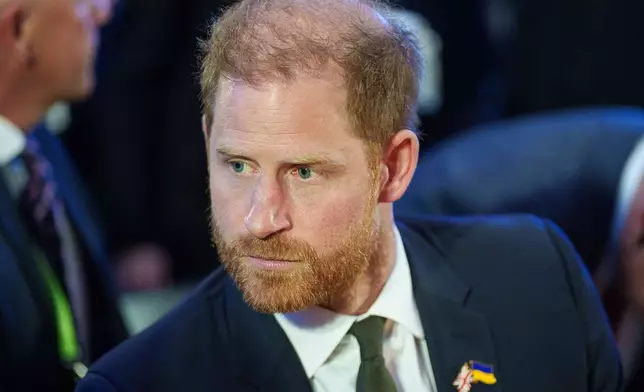 Britain's Prince Harry attends the Security Forum in Kyiv, Ukraine, on Thursday, April 23, 2026. (AP Photo/Evgeniy Maloletka)