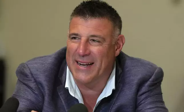 New England Patriots head coach Mike Vrabel speaks to reporters at the NFL football annual meetings, Tuesday, March 31, 2026, in Phoenix. (AP Photo/Ross D. Franklin)