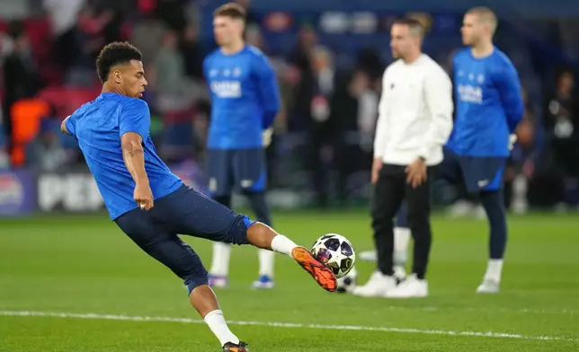 PSG's Desire Doue kicks the ball as he warms-up before the Champions League quarterfinal first leg soccer match between Paris Saint-Germain and Liverpool in Paris, Wednesday, April 8, 2026. (AP Photo/Aurelien Morissard)