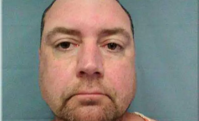 This booking photo provided by the Okaloosa County Sheriff's Office on Thursday, April 23, 2026, shows Christopher Gillum. (Okaloosa County Sheriff's Office via AP)