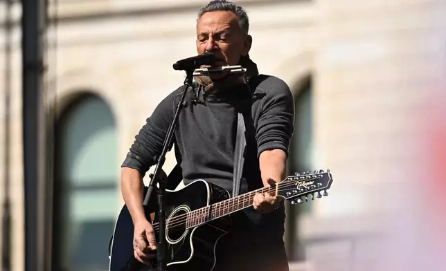Bruce Springsteen performs during tthe "No Kings" protest Saturday, March 28, 2026, in St. Paul, Minn. (AP Photo/Tom Baker)