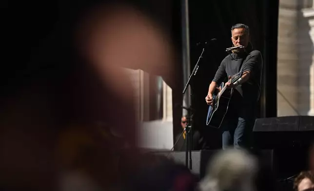 Bruce Springsteen performs during tthe "No Kings" protest Saturday, March 28, 2026, in St. Paul, Minn. (AP Photo/Tom Baker)