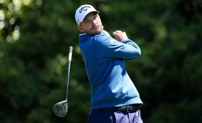 Rasmus Hojgaard, of Denmark, watches his tee shot on the 11th hole during the first round of the Masters golf tournament at the Augusta National Golf Club, Thursday, April 9, 2026, in Augusta, Ga. (AP Photo/Matt Slocum)