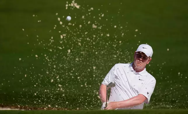Robert MacIntyre, of Scotland, hits from the bunker on the second hole during the second round of the Masters golf tournament at the Augusta National Golf Club, Friday, April 10, 2026, in Augusta, Ga. (AP Photo/David J. Phillip)