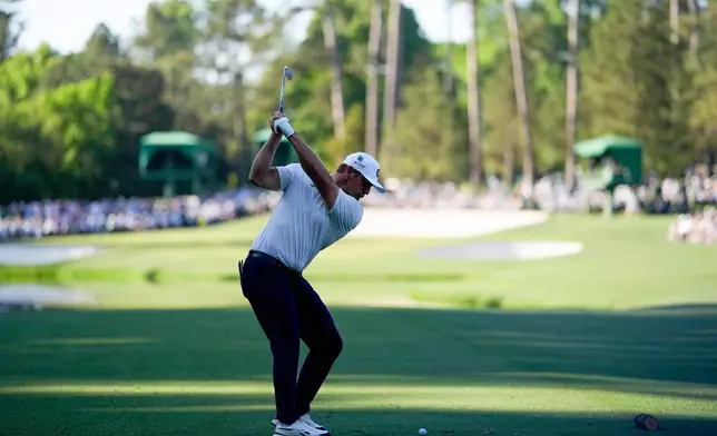 Bryson DeChambeau hits his tee shot on the 16th hole during the second round of the Masters golf tournament at the Augusta National Golf Club, Friday, April 10, 2026, in Augusta, Ga. (AP Photo/David J. Phillip)