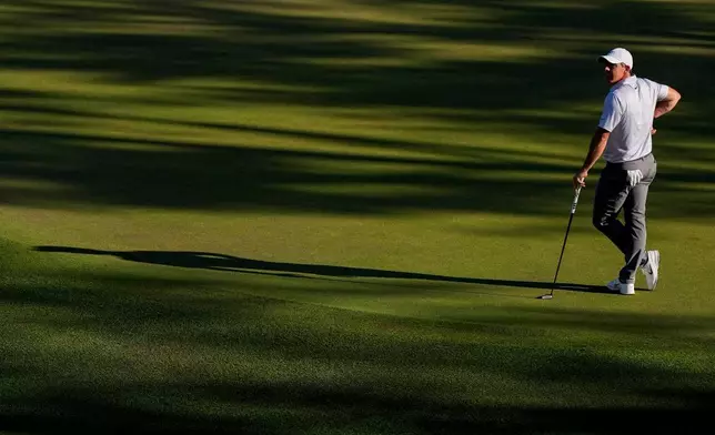 Rory McIlroy, of Northern Ireland, waits to play on the 16th hole during the second round of the Masters golf tournament at the Augusta National Golf Club, Friday, April 10, 2026, in Augusta, Ga. (AP Photo/Ashley Landis)