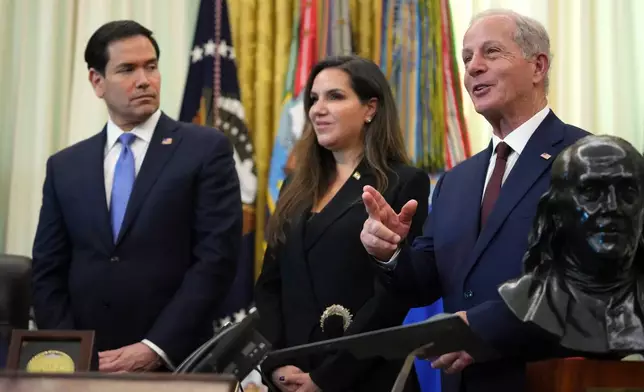 U.S. Ambassador to Lebanon Michel Issa, right, speaks as Secretary of State Marco Rubio and Lebanese Ambassador to the U.S. Nada Hamadeh Moawad, listen during a meeting between the ambassadors of Israel and Lebanon in the Oval Office at the White House, Thursday, April 23, 2026, in Washington. (AP Photo/Mark Schiefelbein)