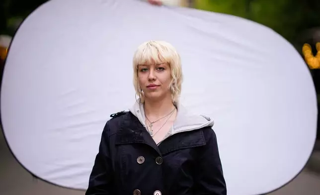 Andrea Anna Hajdu, 22, poses for a portrait in Budapest, Hungary, Monday, April 13, 2026. "This whole movement started with us, with student protests. They couldn't lead us on. We were hungry for change." (AP Photo/Petr David Josek)