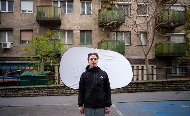 Jakab Szilagyi-Trefas, 22, poses for a portrait in Budapest, Hungary, Monday, April 13, 2026. "Young people brought out the bravery of society." (AP Photo/Petr David Josek)