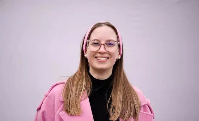 Eszter Tovai, 22, poses for a portrait in Budapest, Hungary, Monday, April 13, 2026. "It was our responsibility to talk to people and change their minds. I personally persuaded seven people to vote for change." (AP Photo/Petr David Josek)