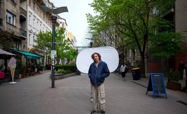 Vincent Nelson, 20, poses for a portrait in Budapest, Hungary, Monday, April 13, 2026. "We didn't like what we were seeing and had to do something about it." (AP Photo/Petr David Josek)