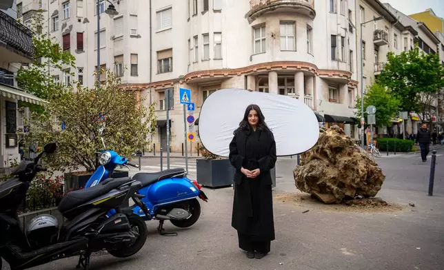 Sara Karpati, 21, poses for a portrait in Budapest, Hungary, Monday, April 13, 2026. "Every four years, a new generation gets to vote, and each one is less likely to blindly trust what they're told." (AP Photo/Petr David Josek)