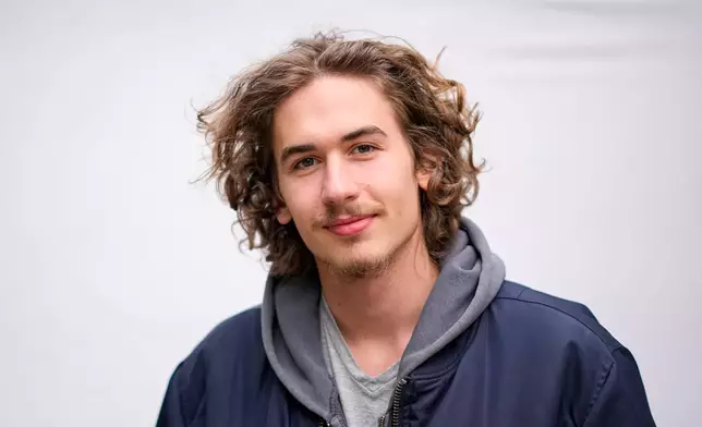 Vincent Nelson, 20, poses for a portrait in Budapest, Hungary, Monday, April 13, 2026. "We didn't like what we were seeing and had to do something about it." (AP Photo/Petr David Josek)