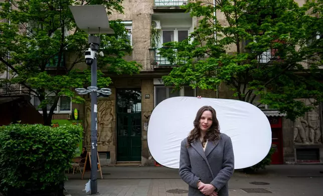 Dori Szaday, 22, poses for a portrait in Budapest, Hungary, Monday, April 13, 2026. "There's a belief that Hungarians are willing to put up with anything. We finally proved that wrong." (AP Photo/Petr David Josek)